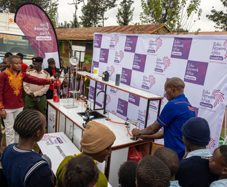 School Equipment Production Unit (SEPU) Staff guides learners and the teacher at Thirikwa Primary School on the use of the Mobile Laboratory