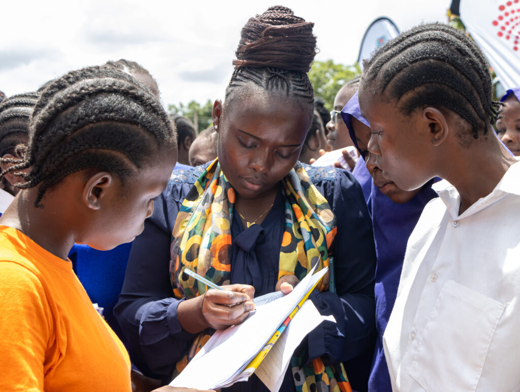 Science Teacher, Caroline Kache, interacts with her students