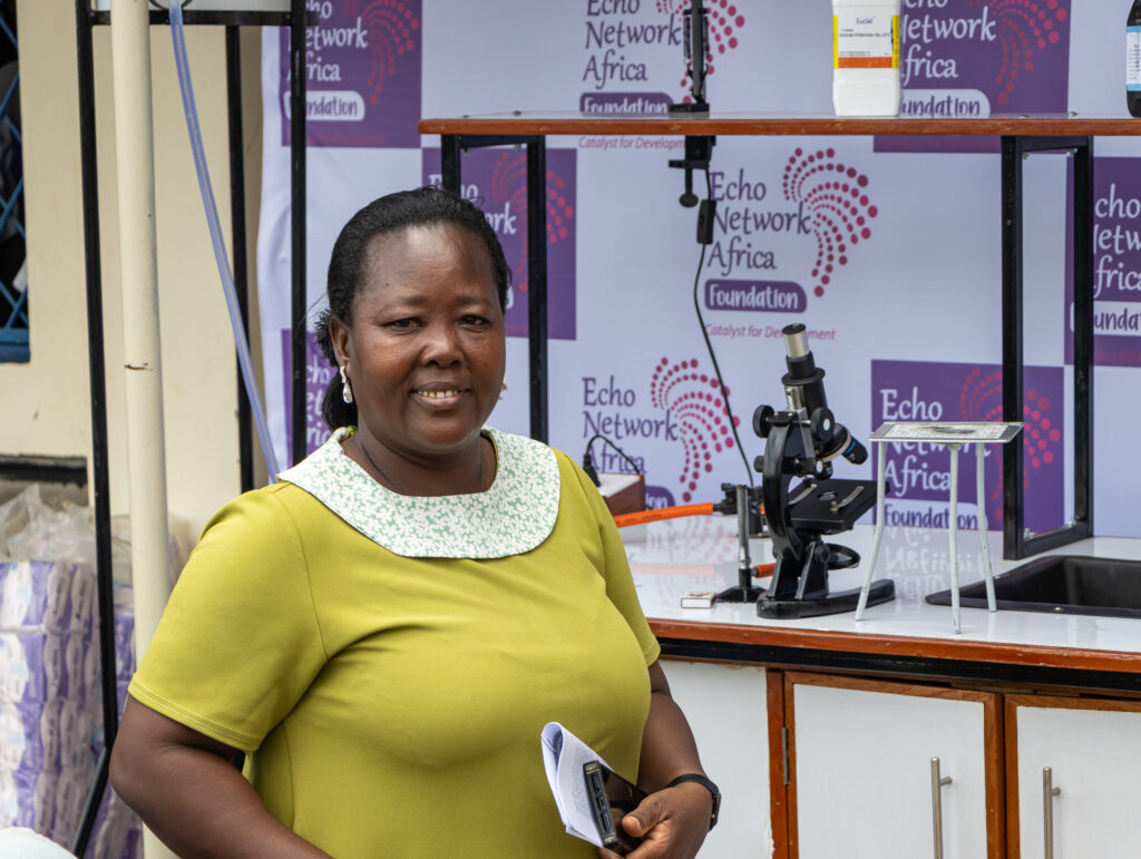 Tunzanani Primary School Headteacher, Ms Doris Jeza at the Handover